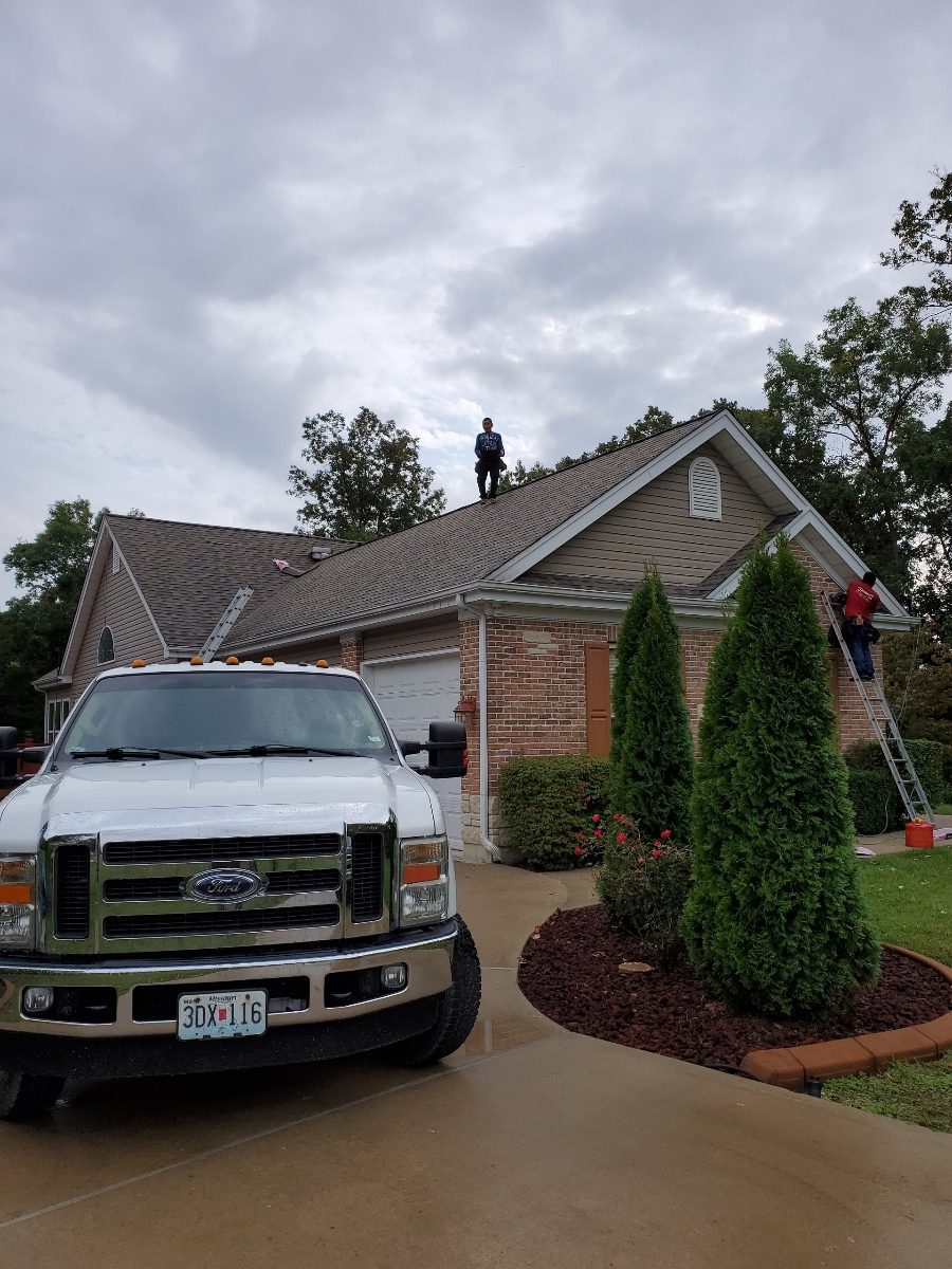 Danni James crew working on a residential roof